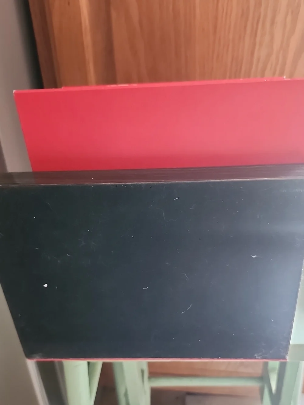Carolina Herrera Red and Wood Two-Tier Display